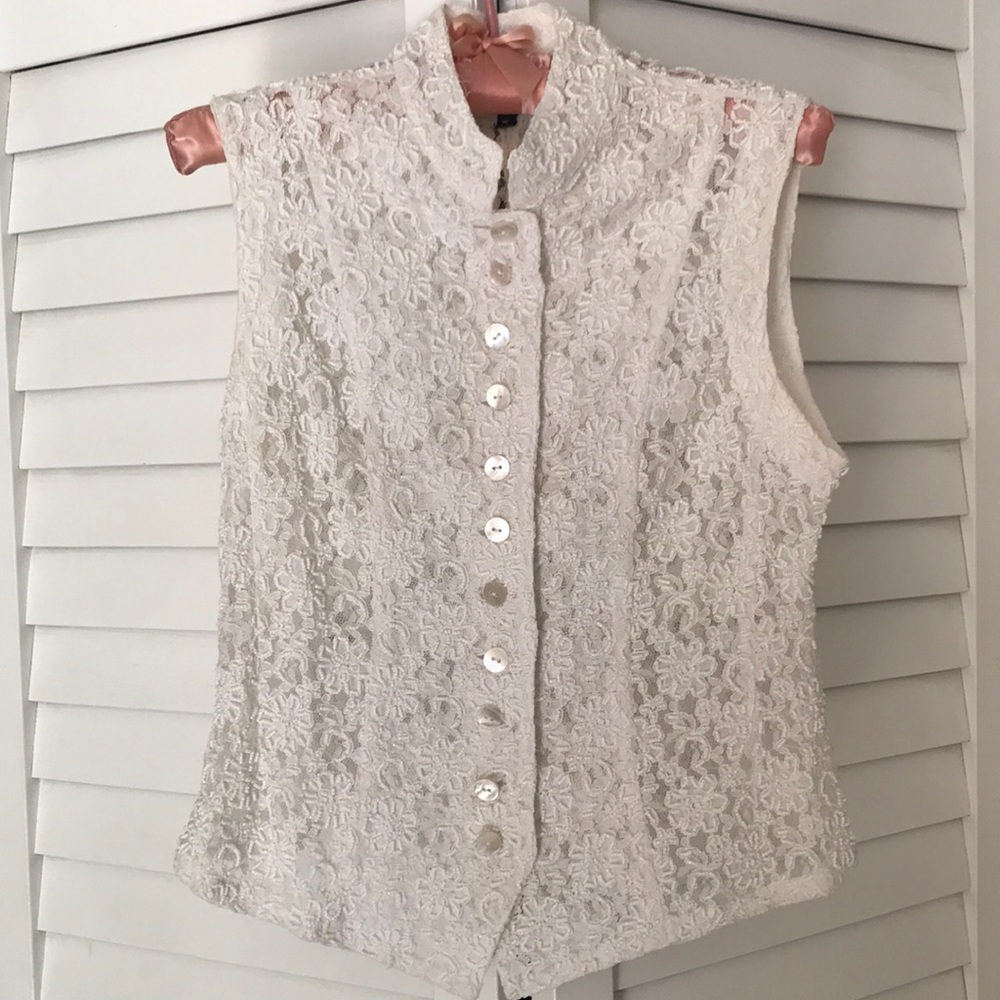 Slight off white beaded vest with pearlized buttons. Made by Zoog. Vintage